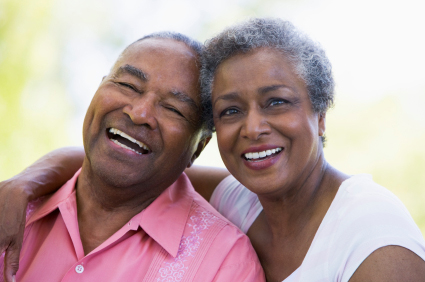 Loving older couple laughing.